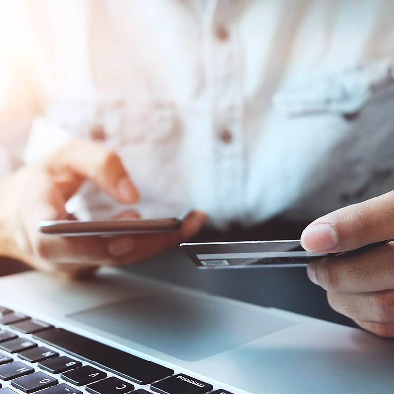 woman depositing funds in an inmates account on her phone